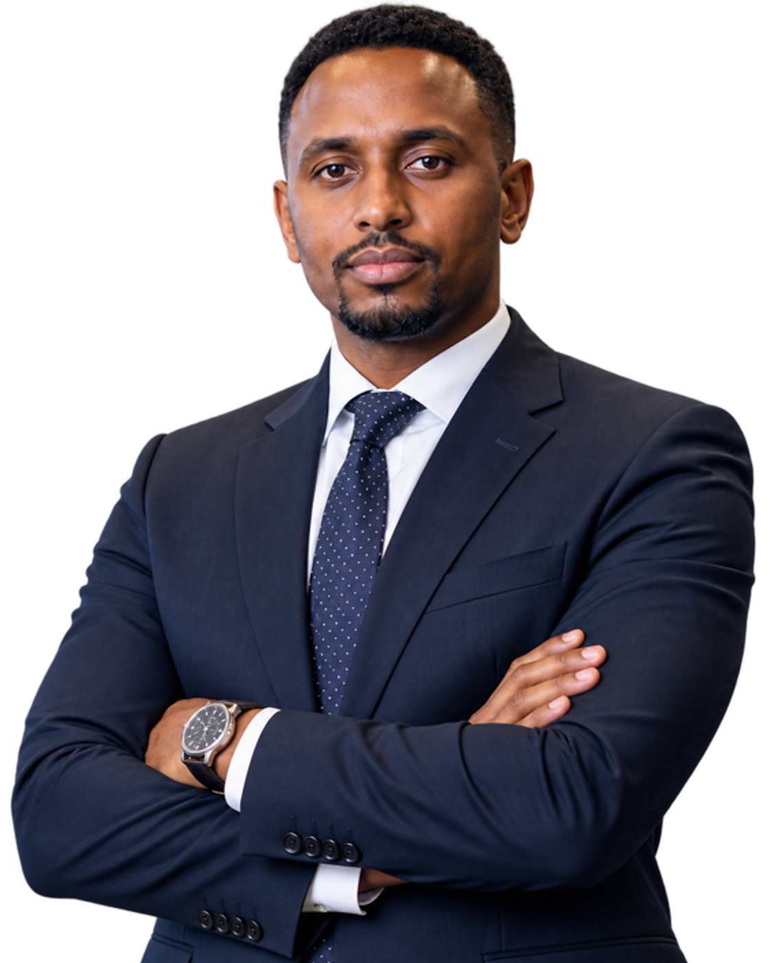 Seylac business professional standing with his arms folded